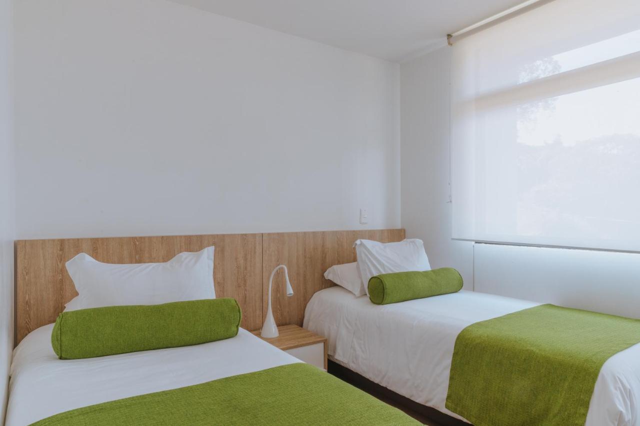 Travelers Rio Verde Living Suites Rionegro Exterior foto